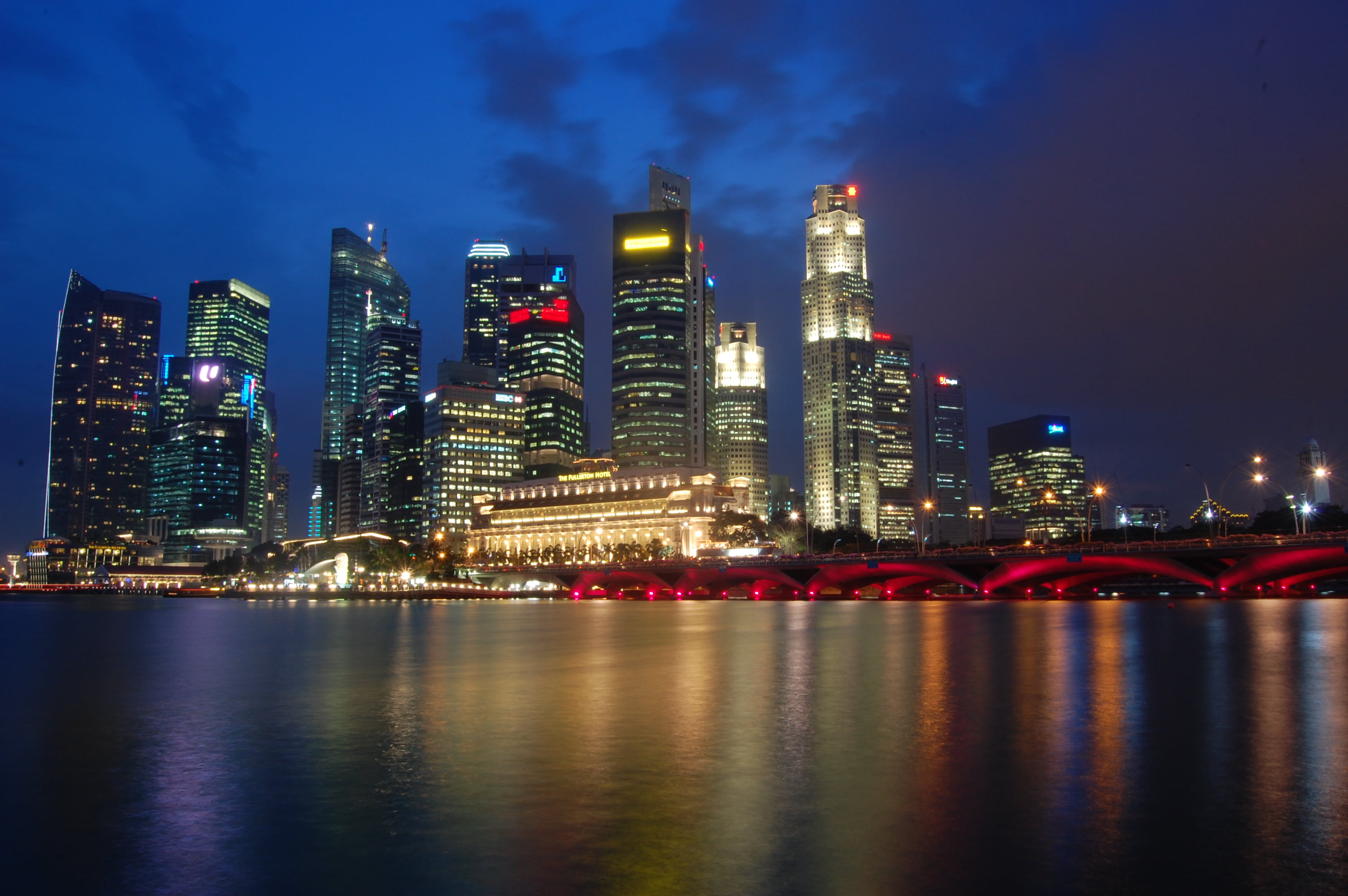 High Rise City Buildings During Night Time Singapore City HD Wallpaper