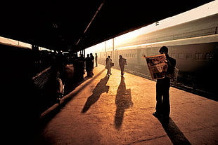 men's black pants, Steve McCurry, India, train station, train