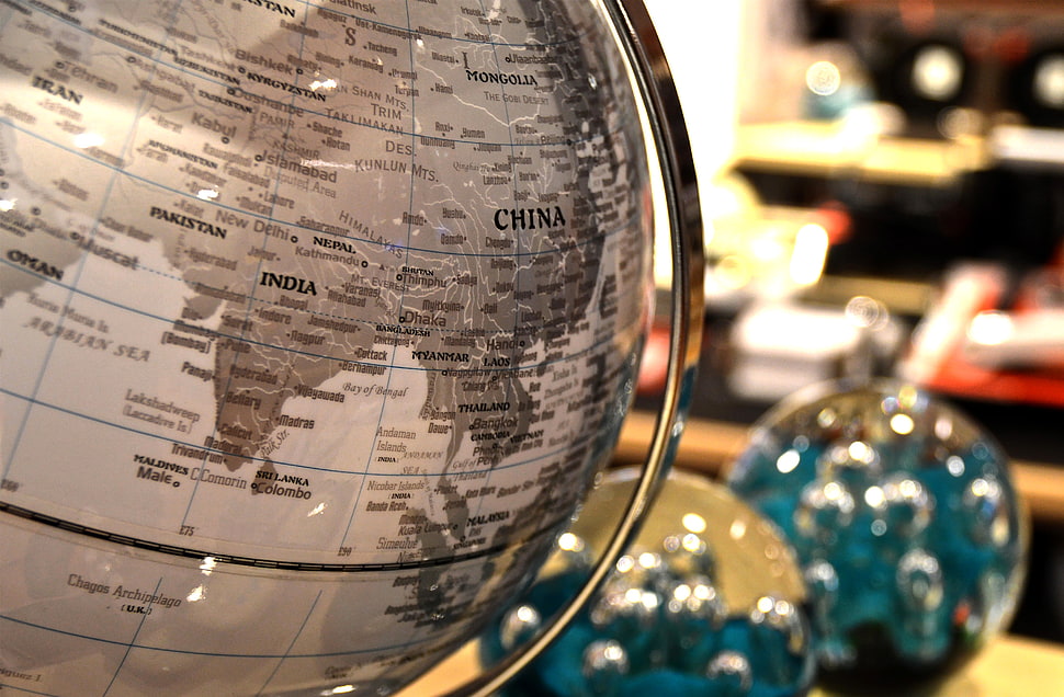 shallow focus photograph of gray table globe HD wallpaper