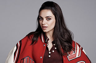 woman wearing red and white letterman jacket