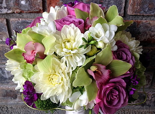 white Dahlias with pink Roses and Orchids arrangement