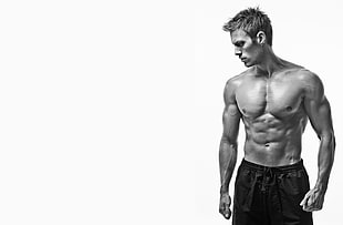 man's topless body with black shorts HD wallpaper