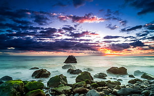 brown stones, beach, sunset, sky, sunlight HD wallpaper