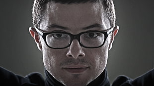 man in black framed eyeglasses