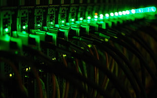 black coated cables with green lighted LEDs