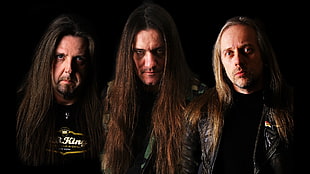 photography of three long-haired men