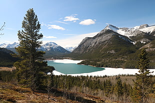lake near mountain HD wallpaper
