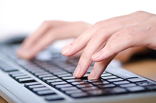 person using a computer keyboard
