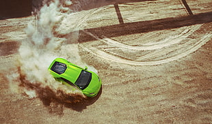 green Lamborghini Huracan drifting on dirt HD wallpaper