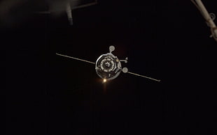 silver-colored pendant necklace, space
