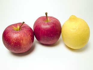 two red Apples and Lemon fruits