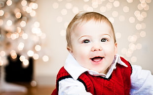baby in white collared shirt and red vest