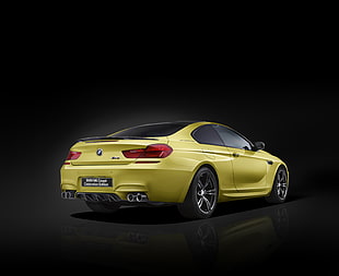 yellow BMW coupe
