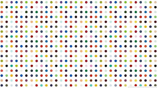 white and multicolored polka-dot wallpaper