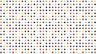 white and multicolored polka-dot wallpaper