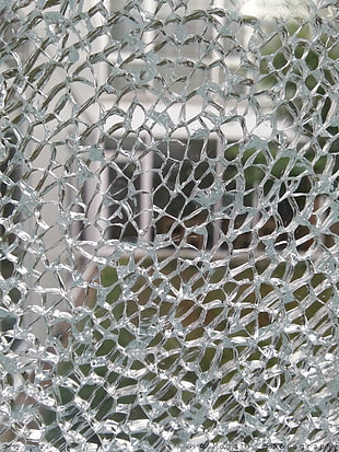 gray net, broken glass