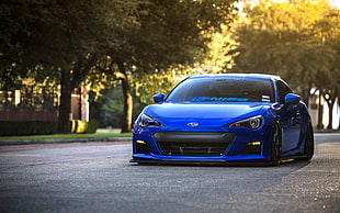 blue coupe on street photography HD wallpaper