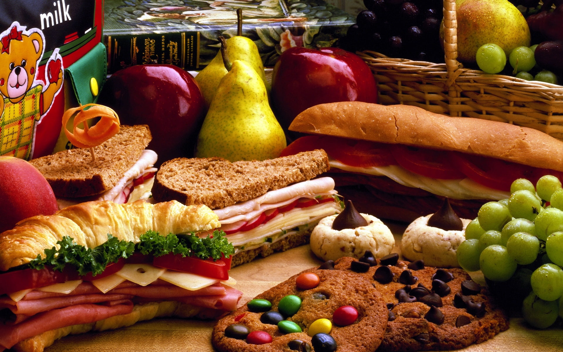 fruits and sandwiches on desk