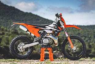 orange motocross dirt bike HD wallpaper