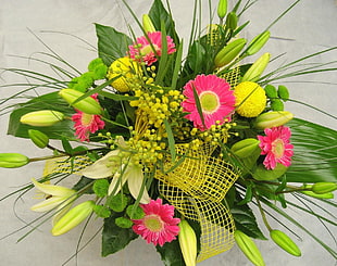 green, yellow, and pink flower bouquet