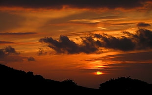 silhouette of mountain during sunset HD wallpaper