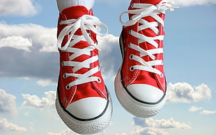 pair of red-and-white low-tops sneakers HD wallpaper