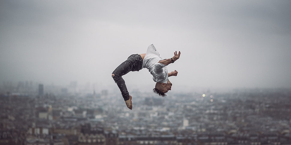 man black flipping above buildings, ballet, jumping, Paris, backflip HD wallpaper