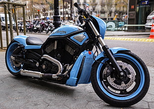 touring motorcycle parked on a sidewalk HD wallpaper