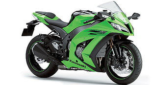green and black Kawasaki Ninja sports bike