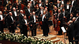 man conducting orchestra
