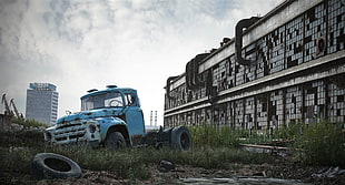 blue tractor unit, ruin