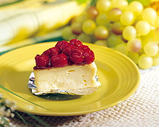 cherry cake with round yellow plate