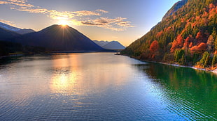 landscape photography of mountain near body of water during daytime