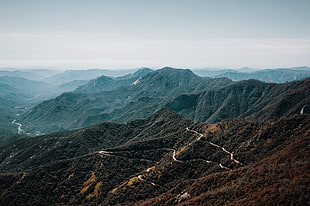 landscape photography of brown mountain during daytime