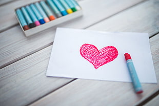 crayon heart drawing on paper