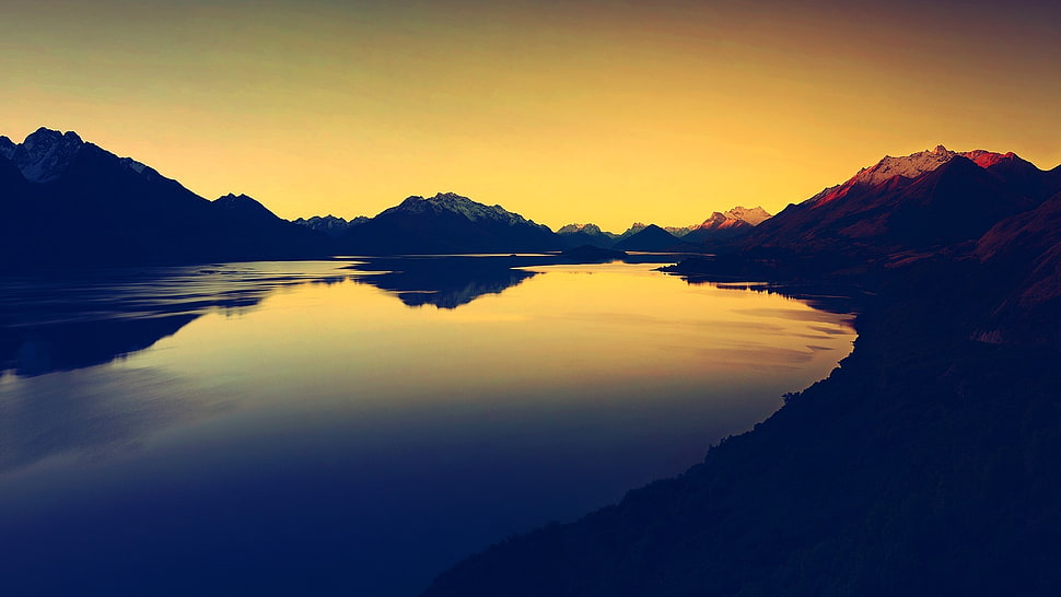 mountains illuminating on body of water, landscape, lake, nature, sunset HD wallpaper