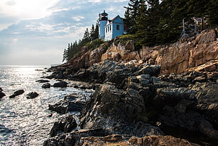 white lighthouse, nature, rock, sea, house