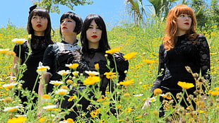 four woman in black dress