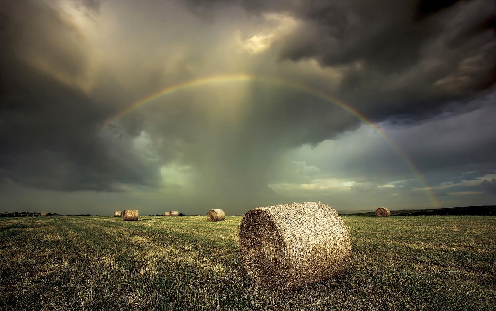 hay bale lot, rainbows, field, clouds, storm