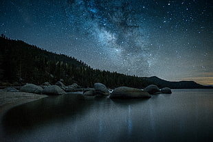 photo of stars over body of water during nighttime, nevada, lake tahoe