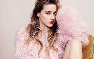 woman in pink fur coat