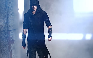 man wearing black hoodie and black bottoms