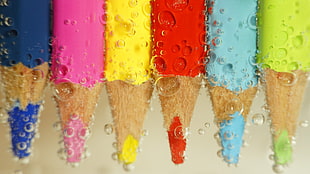 six assorted-color coloring pencils, pencils, bubbles, colorful