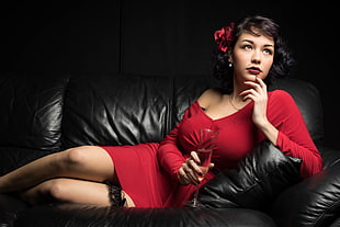 woman in red dress laying on couch HD wallpaper