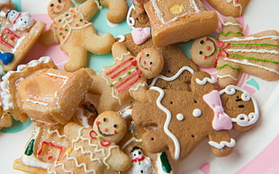 bunch of gingerbread on pink and white plate