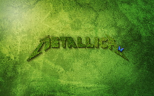 closeup photo of Metallica logo graphic wallpaper