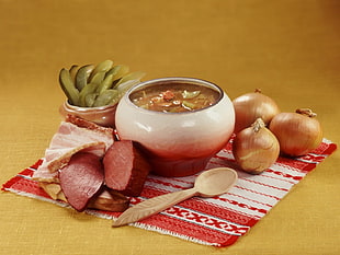 cooked soup with meat in bowl