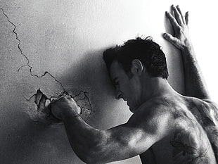 man punching the wall HD wallpaper