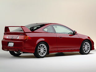 photography of red Acura RSX coupe