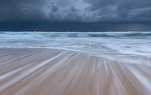 brown beach sand with ocean waves painting HD wallpaper